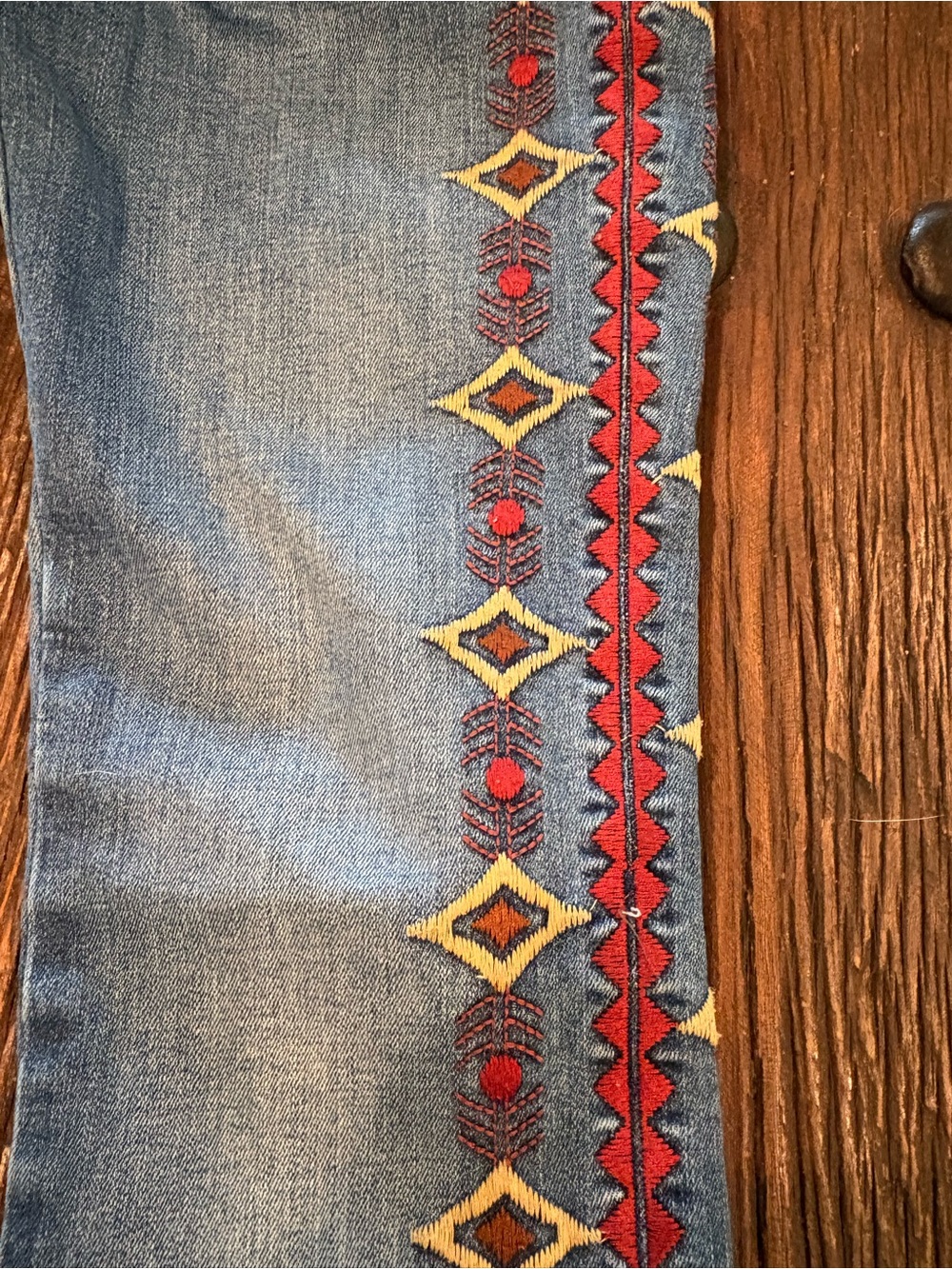 DRIFTWOOD Blue Flare Jeans with Red, Yellow & Cream Embroidery - Picture 5 of 8